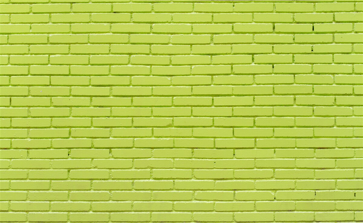 Fototapet Perete din cărămidă în nuanță verde deschis