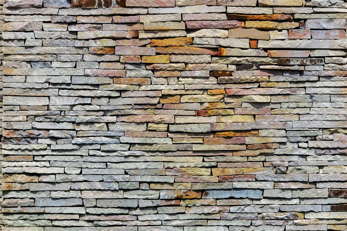 Fototapet Zid acoperit cu benzi de piatră