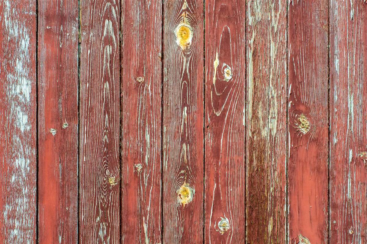 Fototapet fundalul din lemn este roșu și are un aspect antic