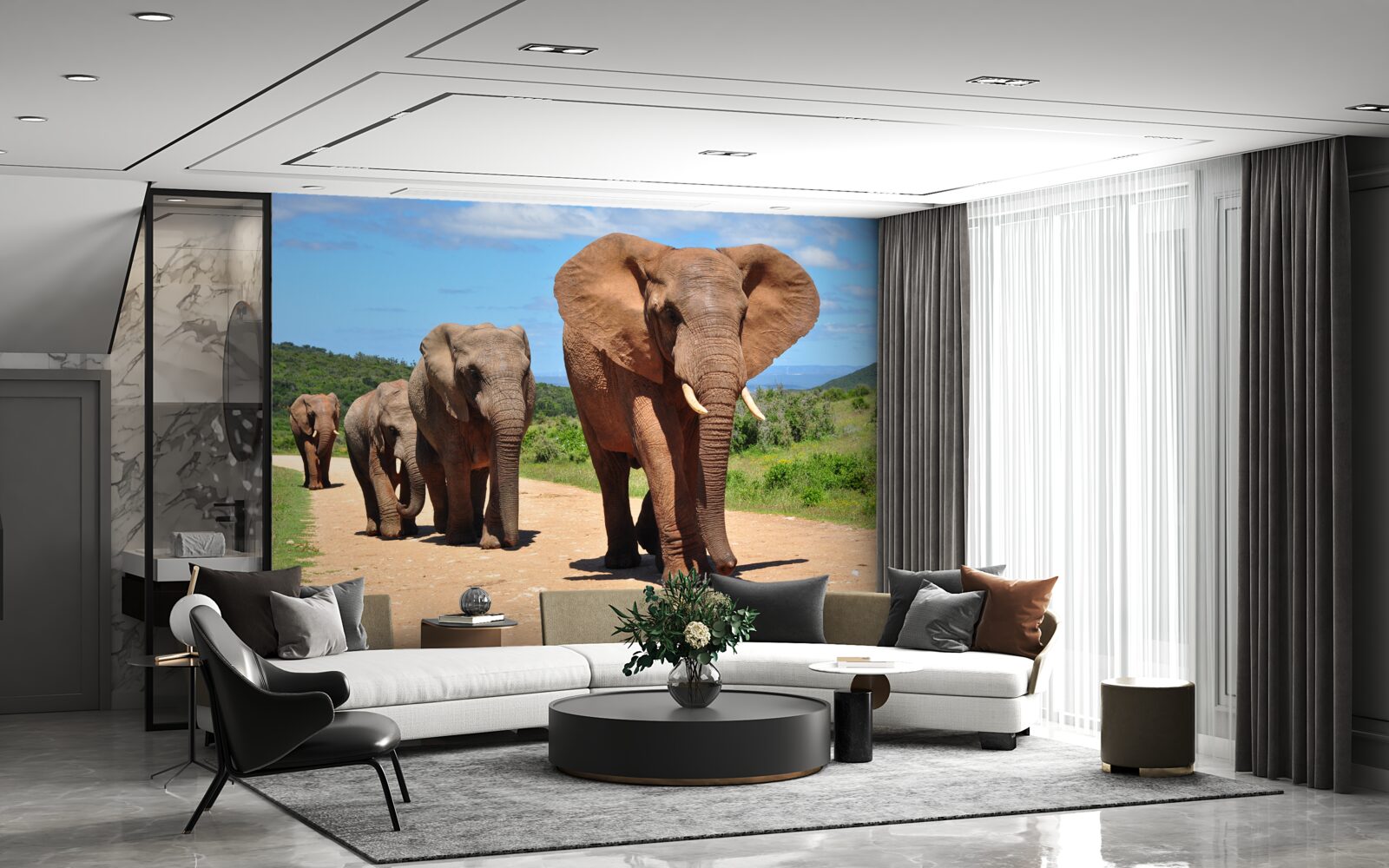 Fototapet Un grup de elefanți se întoarce acasă pe un teren nisipos