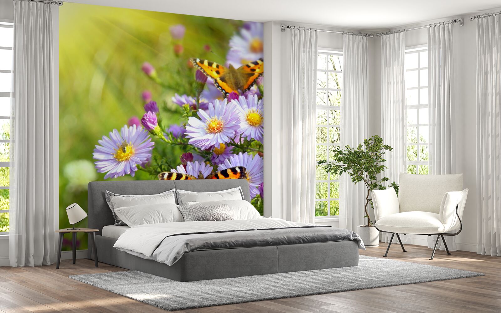 Fototapet O pajiște presărată cu margarete albastre și fluturi