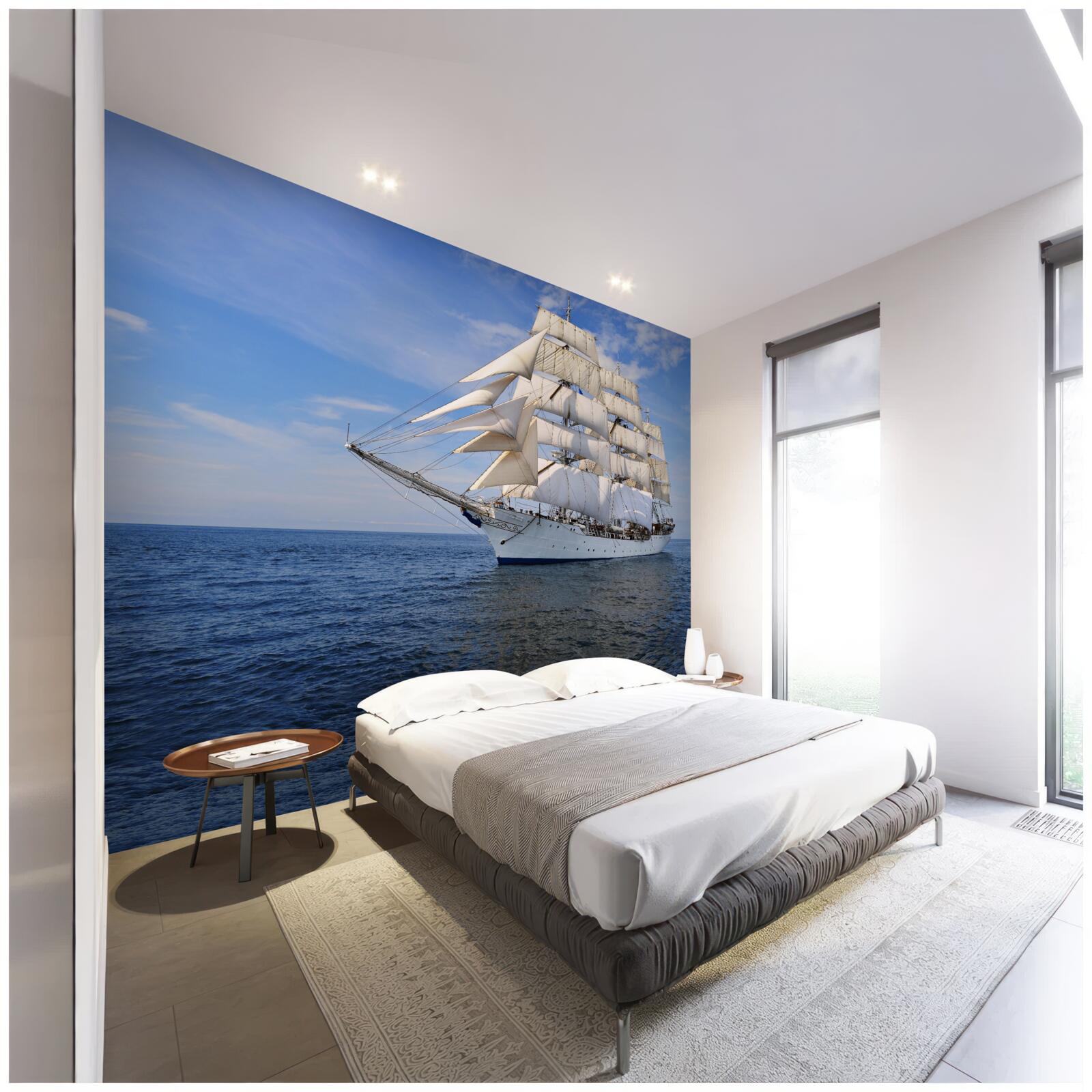 Fototapet o navă cu pânze pe o mare calmă