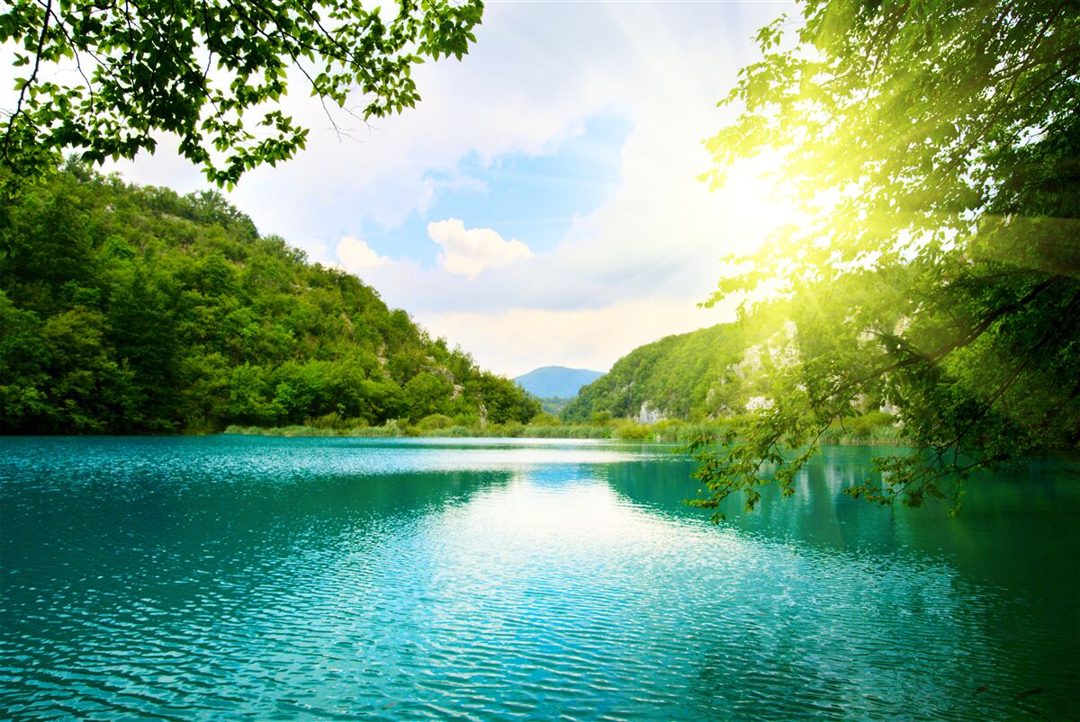 Fototapet răsărit de soare pe suprafața apei