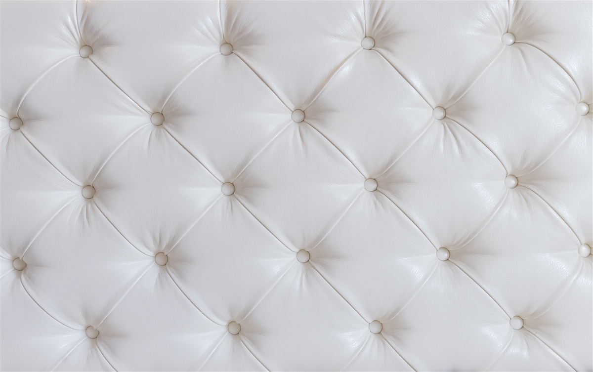 Fototapet tapițerie din piele albă cu decorațiuni strass