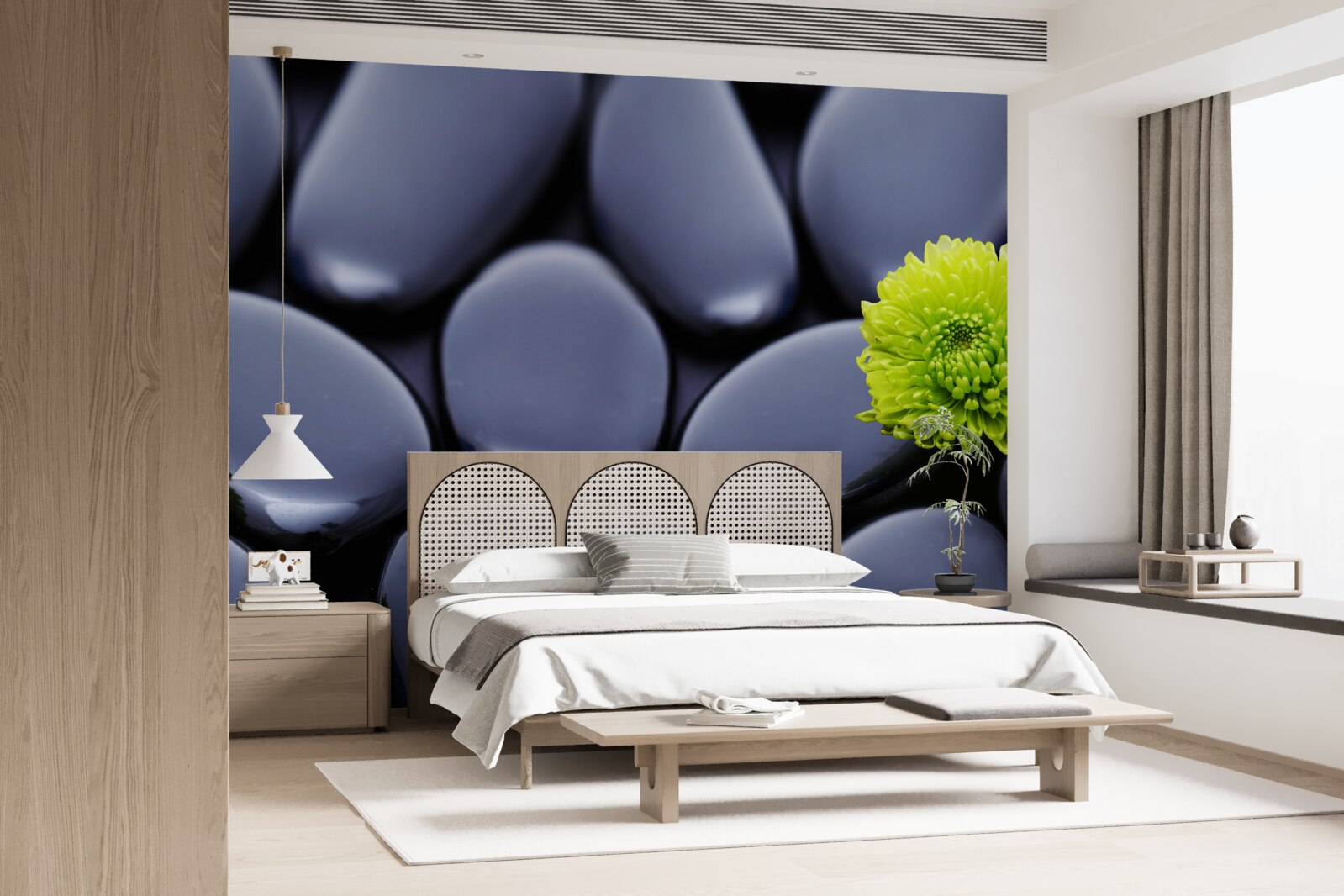 Fototapet o floare verde crește peste o barieră stâncoasă