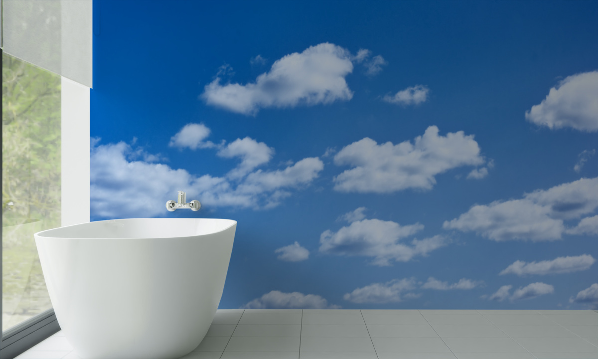 Fototapet nori albi plutind pe un cer albastru