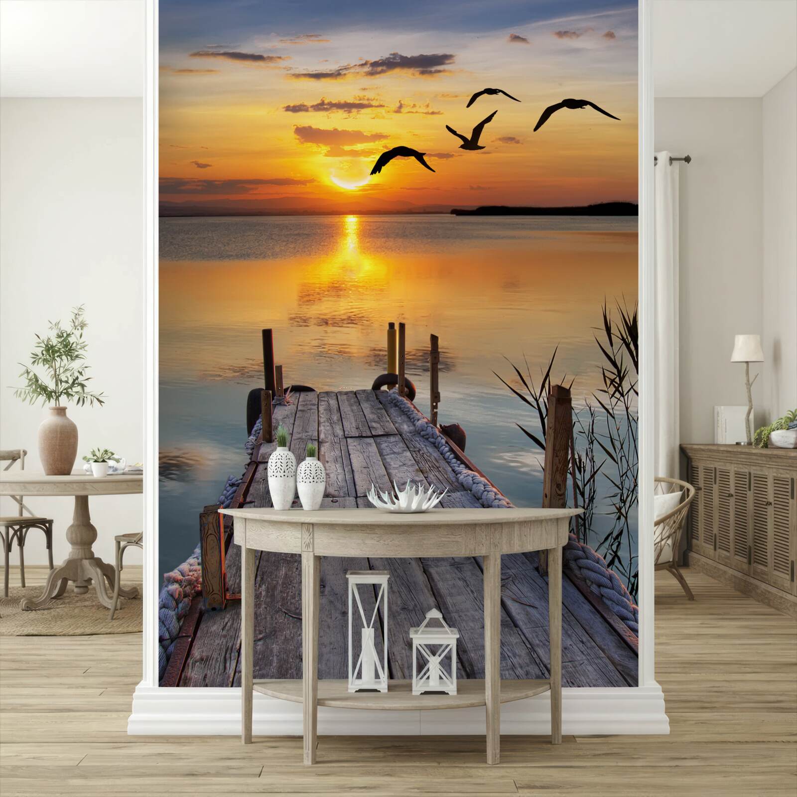 Fototapet un apus de soare cald pe un pod unde se învârt pescărușii