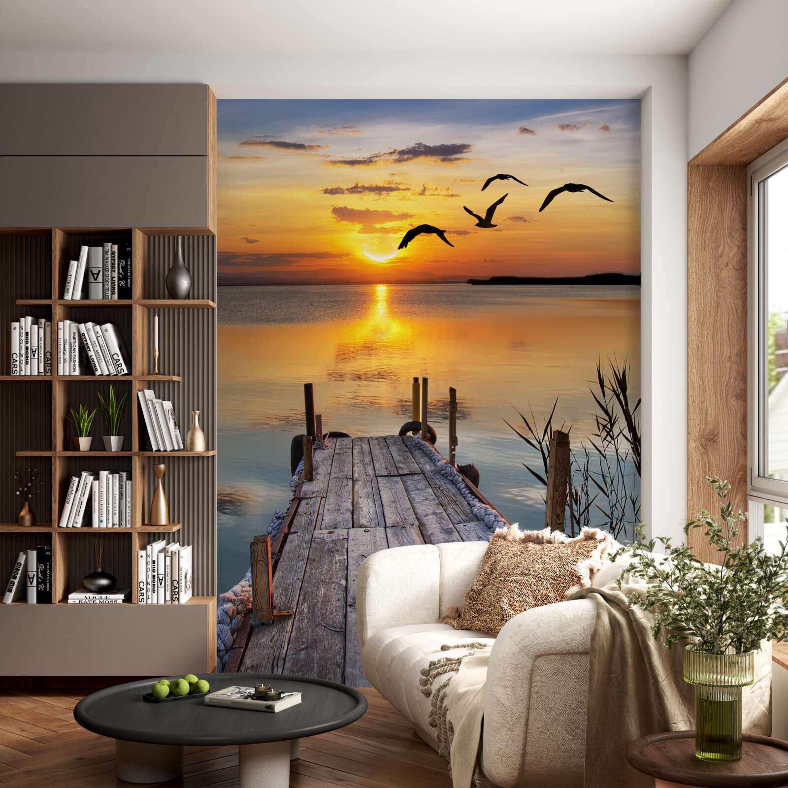 Fototapet un apus de soare cald pe un pod unde se învârt pescărușii