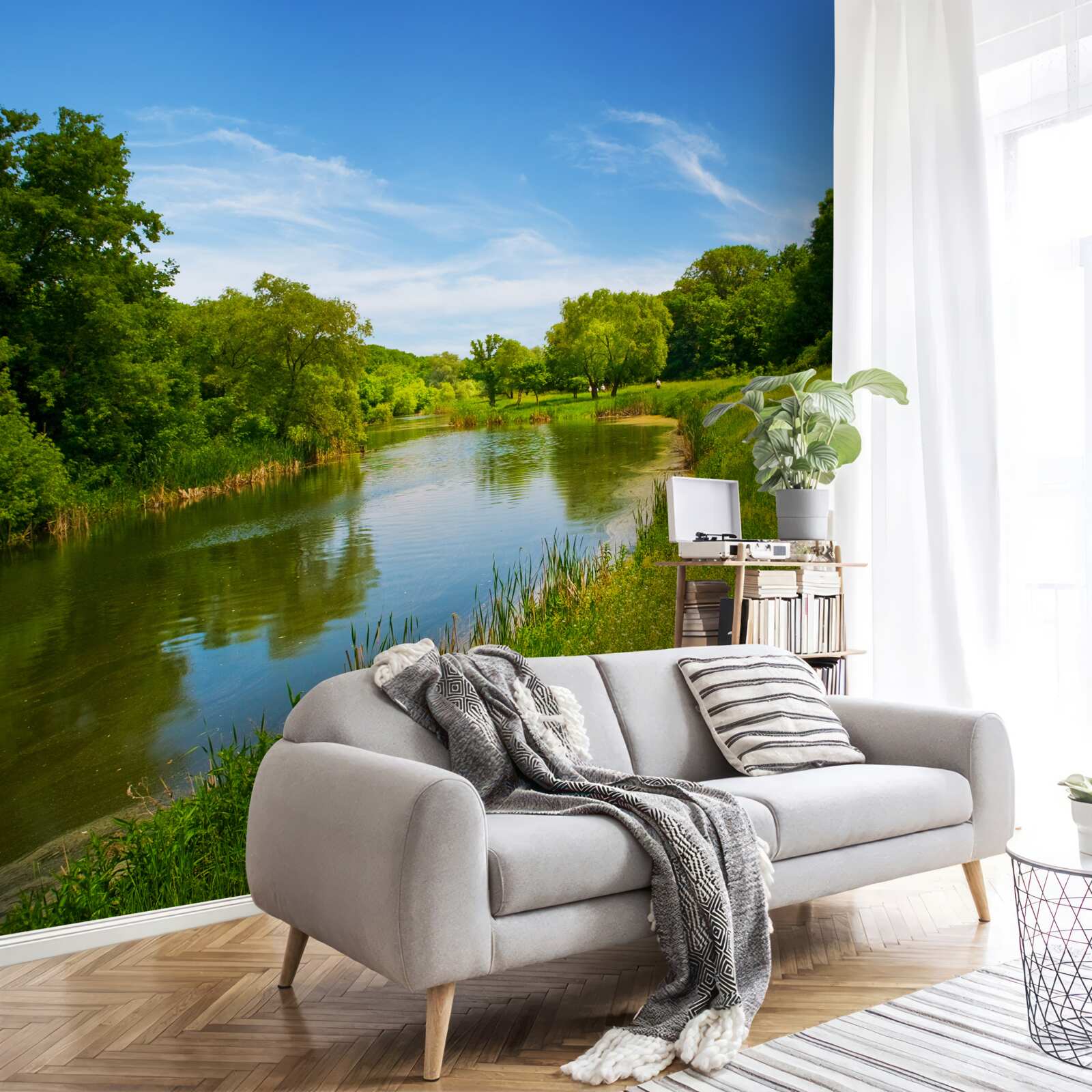 Fototapet o pajiște verde pe care curge o apă calmă