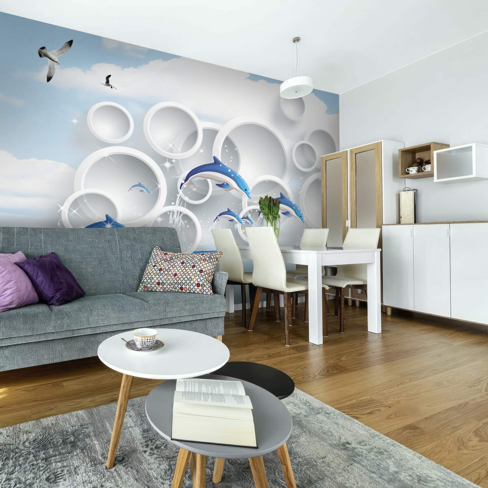 Fototapet inele abstracte și delfini sărind pe suprafața apei