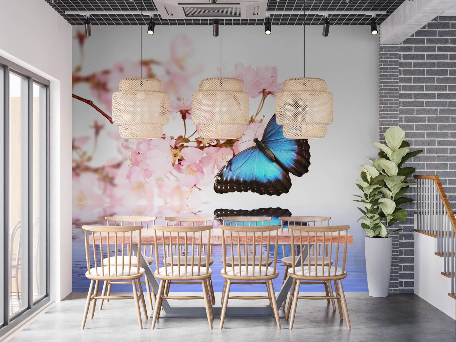 Fototapet un fluture albastru stă pe un cireș lângă apă