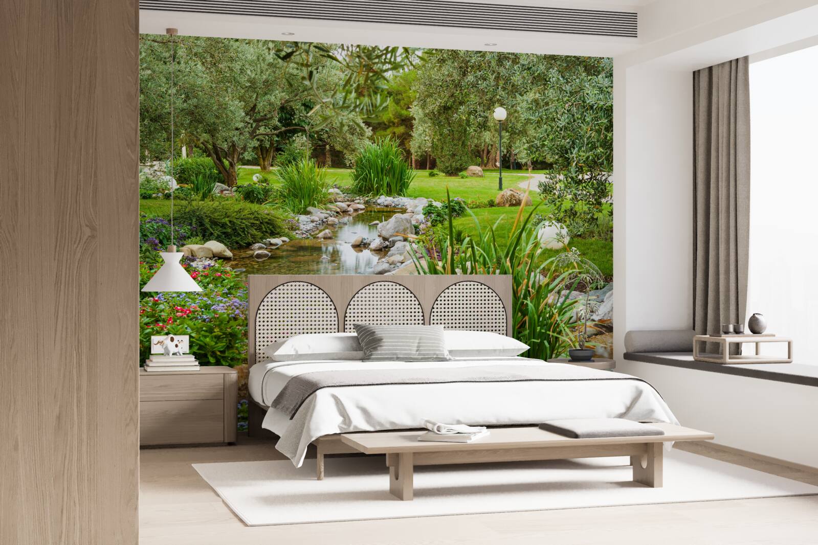 Fototapet un pârâu care curge printr-o pajiște verde