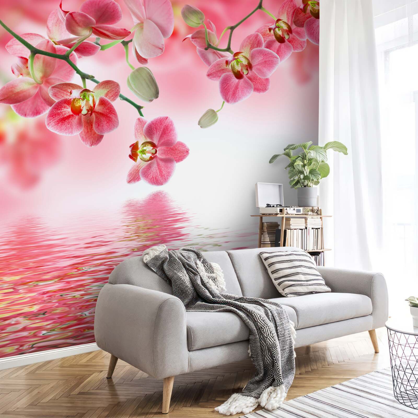 Fototapet o orhidee roșie atârnă pe un copac deasupra apei