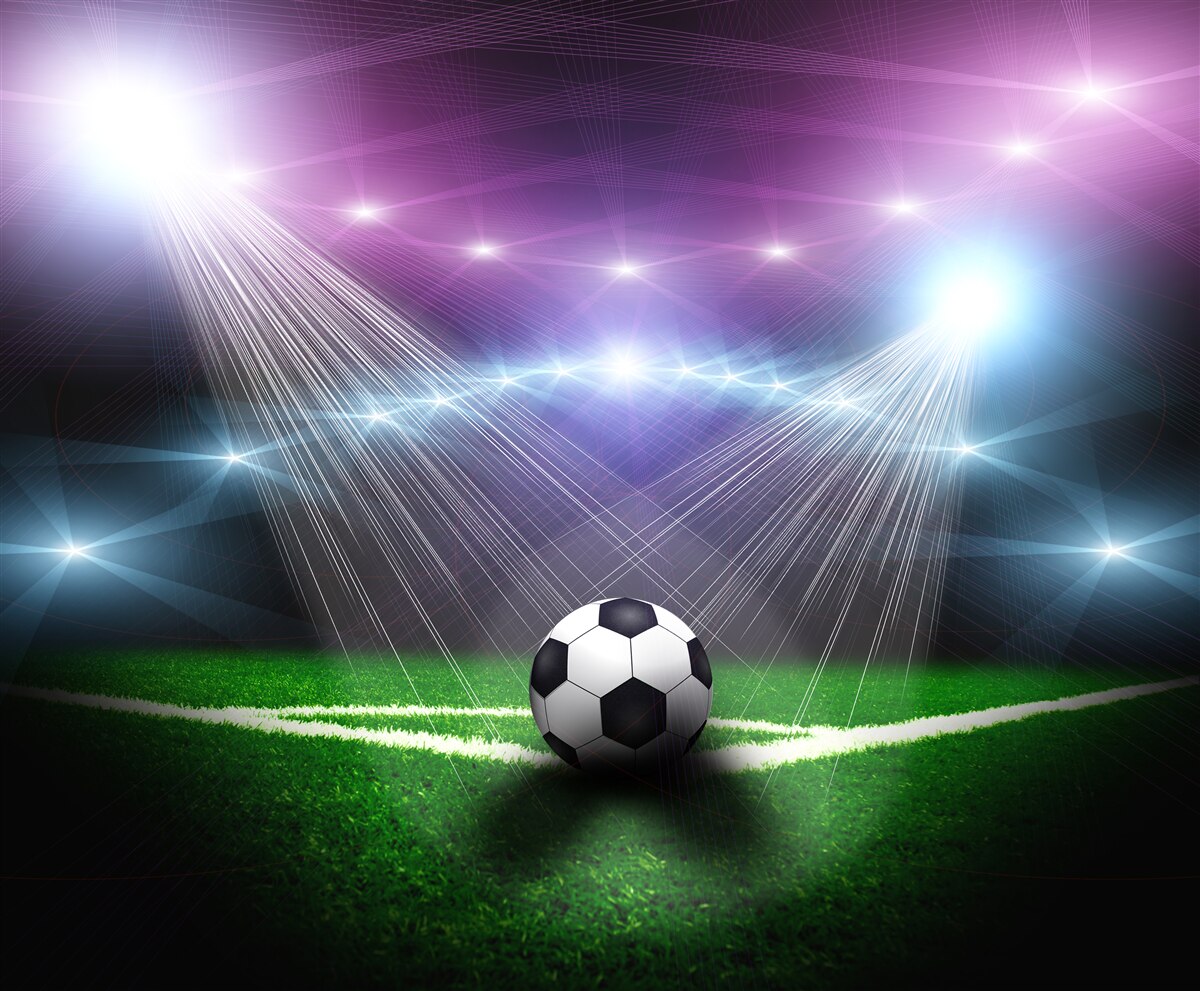 Fototapet fotbalul în lumina reflectoarelor