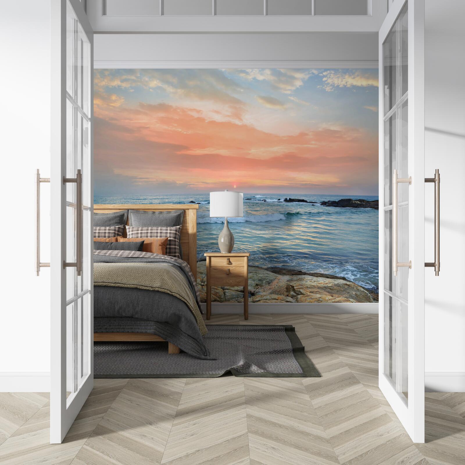 Fototapet oceanul se întinde până la orizont și un apus de soare roz