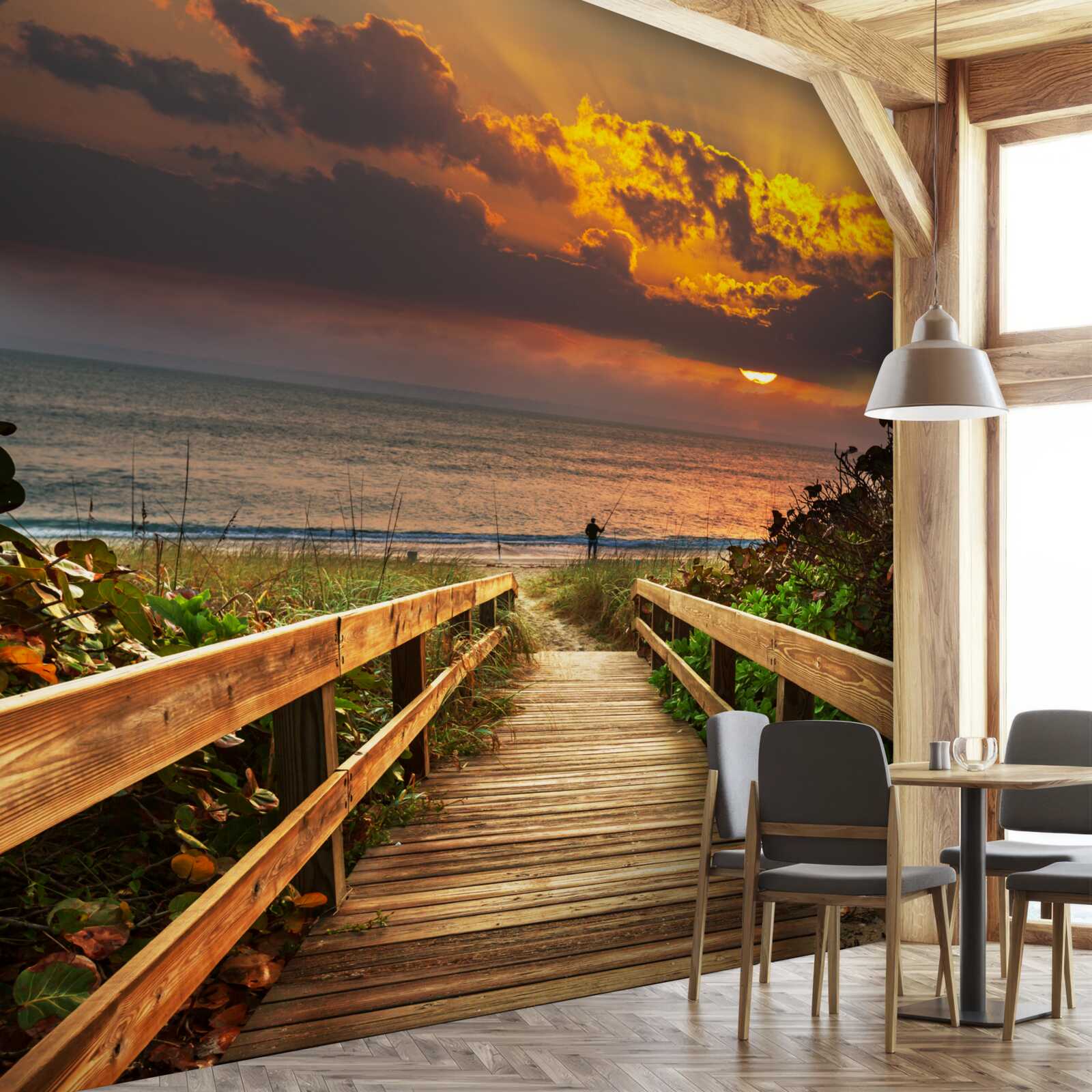 Fototapet soarele apune sub orizont pe malul mării