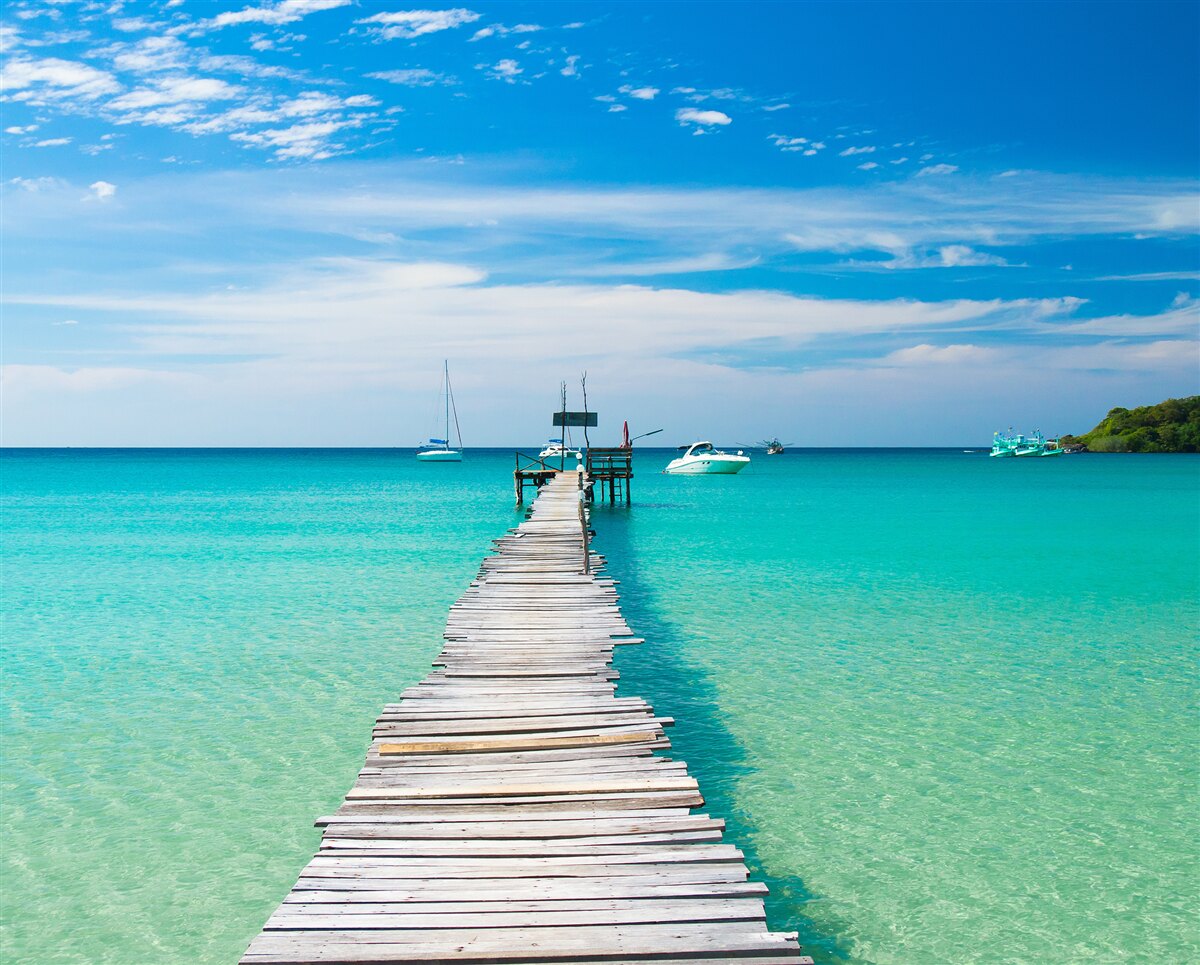 Fototapet pod de lemn peste apa turcoaz