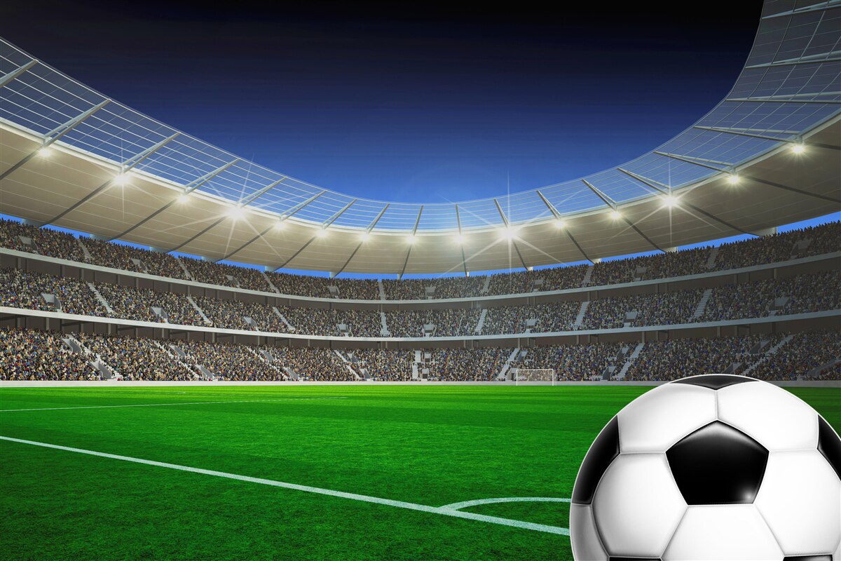 Fototapet o minge de fotbal se află pe teren