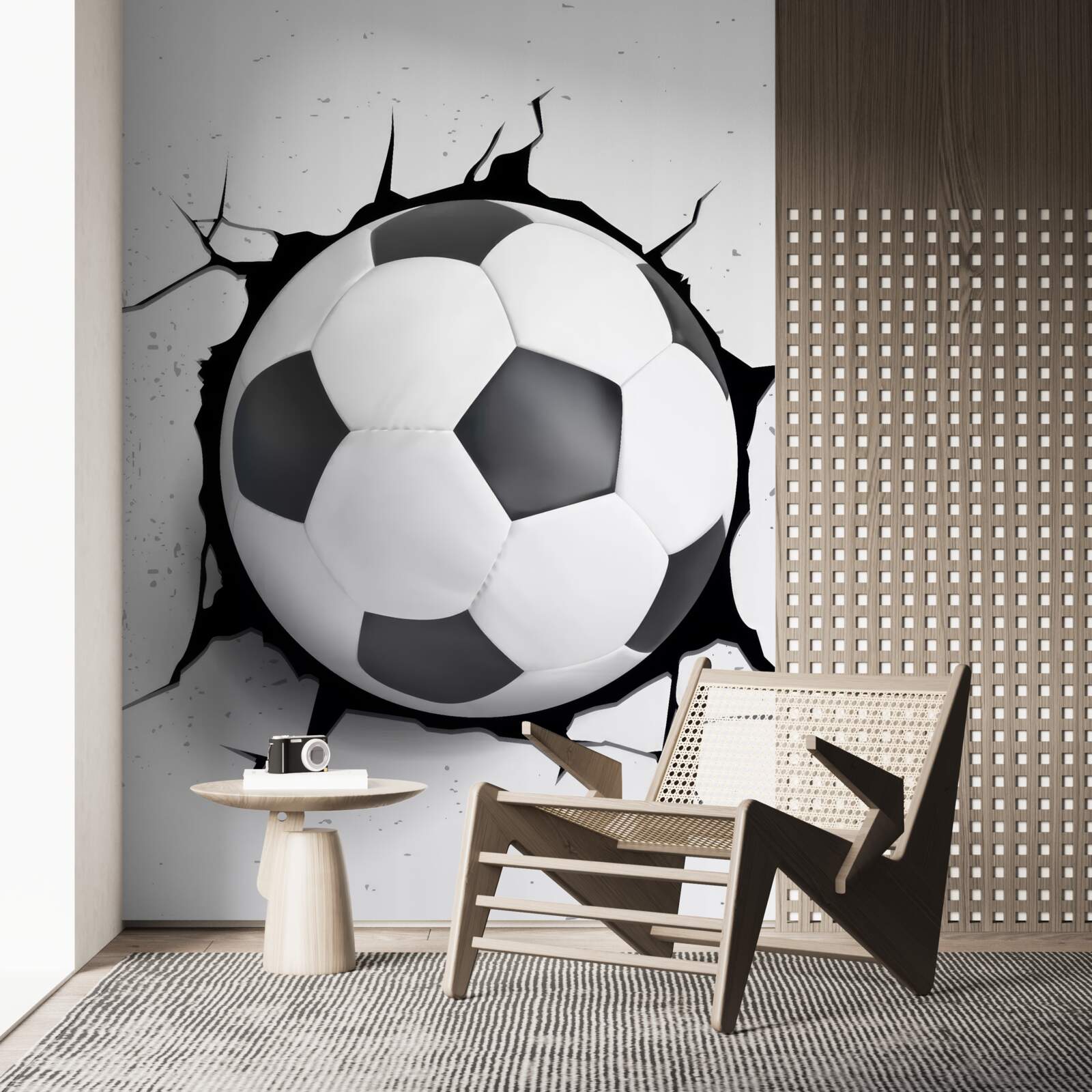 Fototapet o minge de fotbal iese din perete