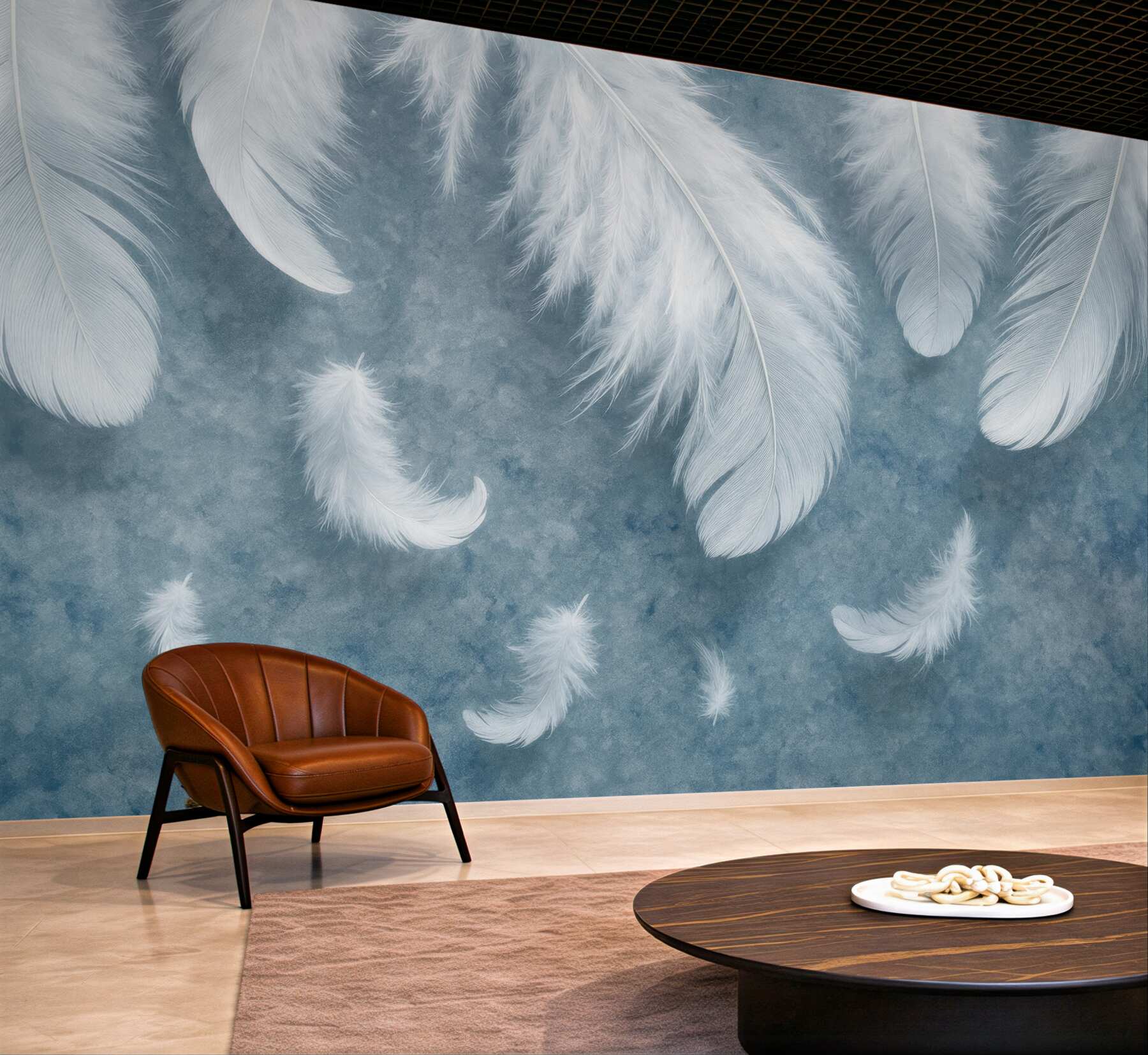 Fototapeta białe piórka na błękitnym tle