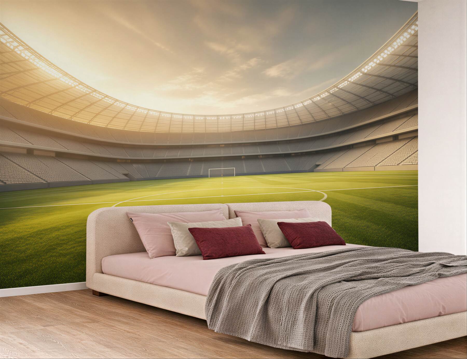 Fototapeta stadion piłkarski z zieloną murawą w świetle zachodzącego słońca