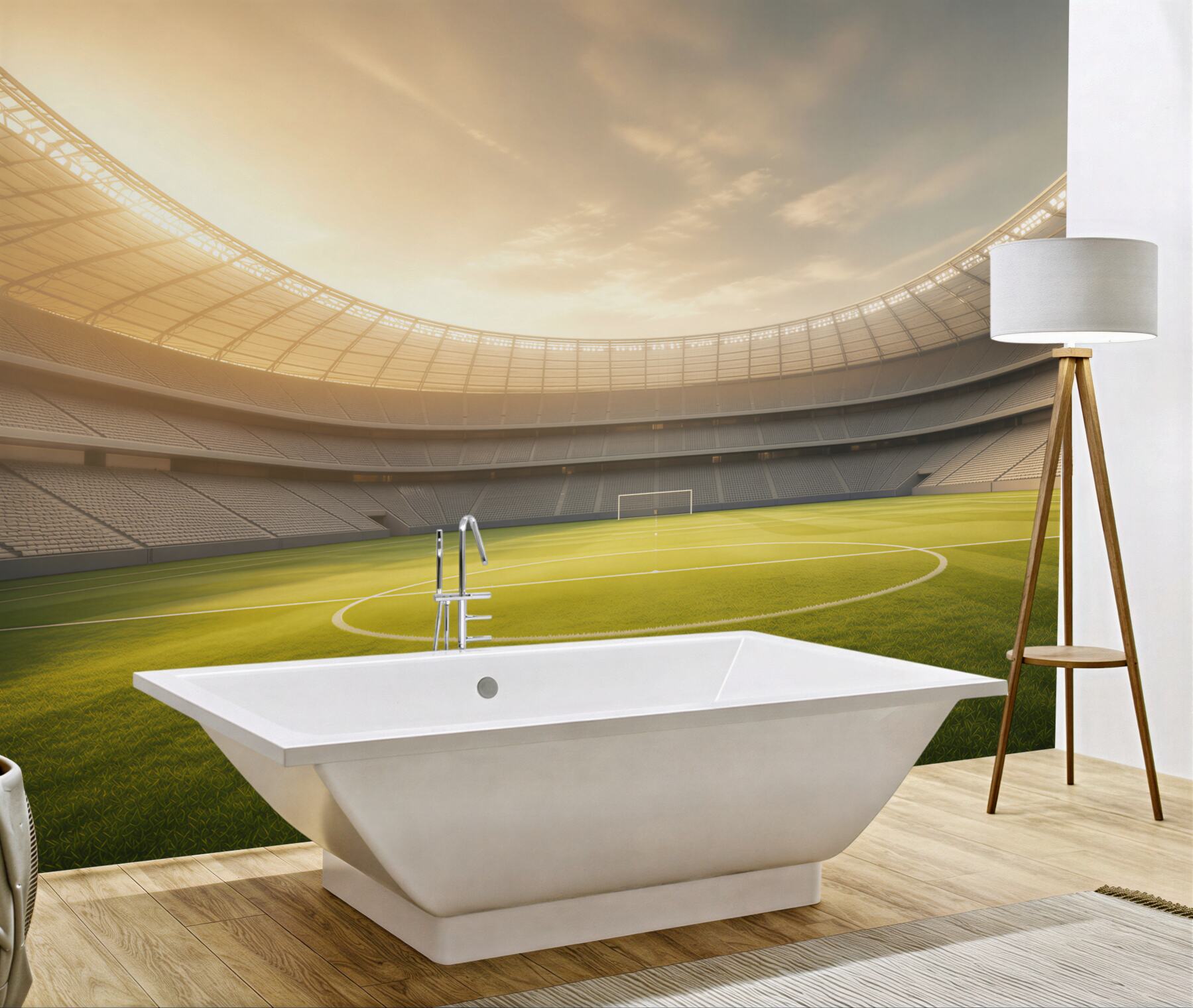 Fototapeta stadion piłkarski z zieloną murawą w świetle zachodzącego słońca